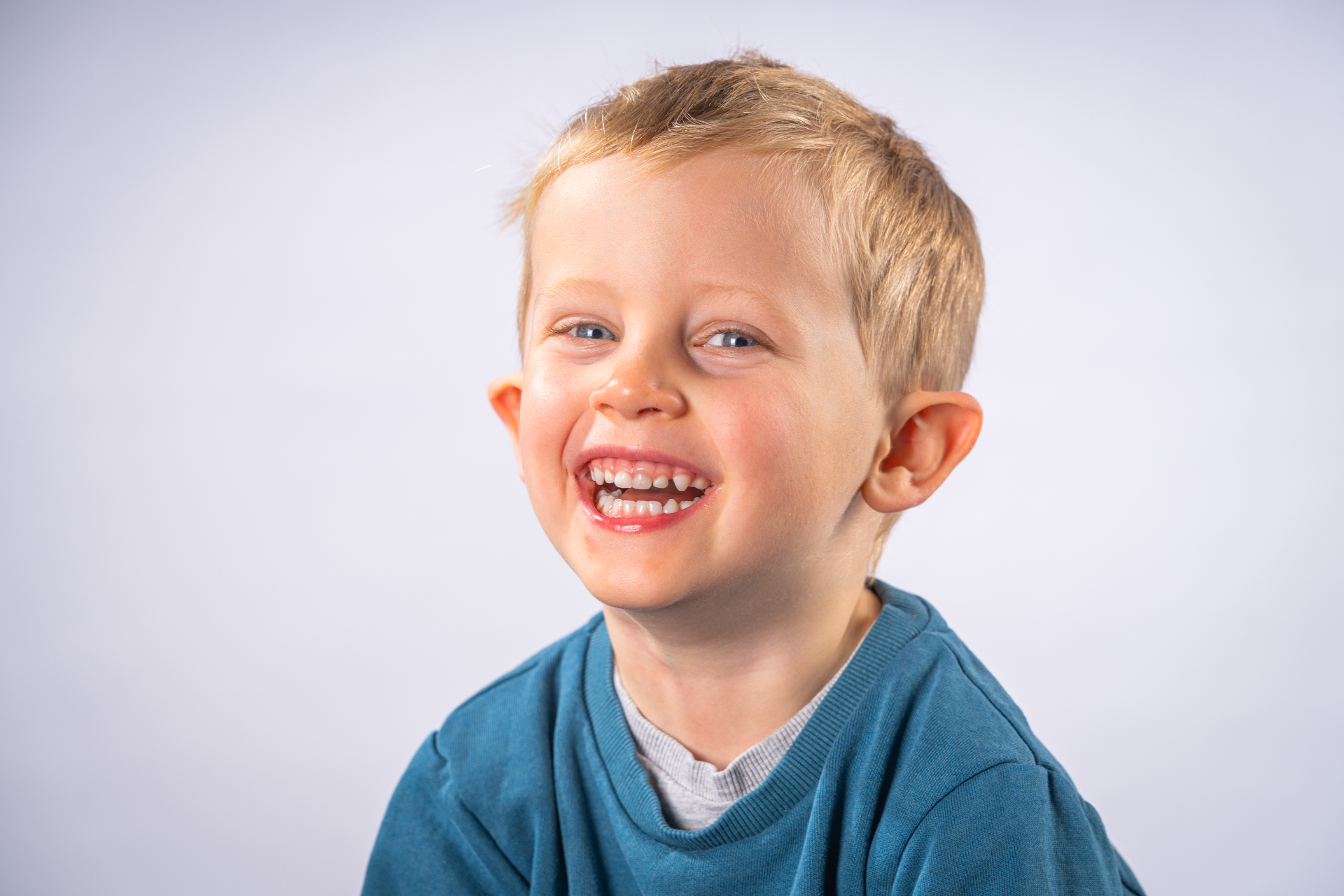 Individual school portrait - boy in teal jumper